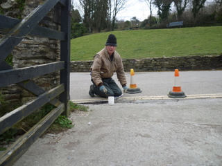 John Hill repairing the entrance